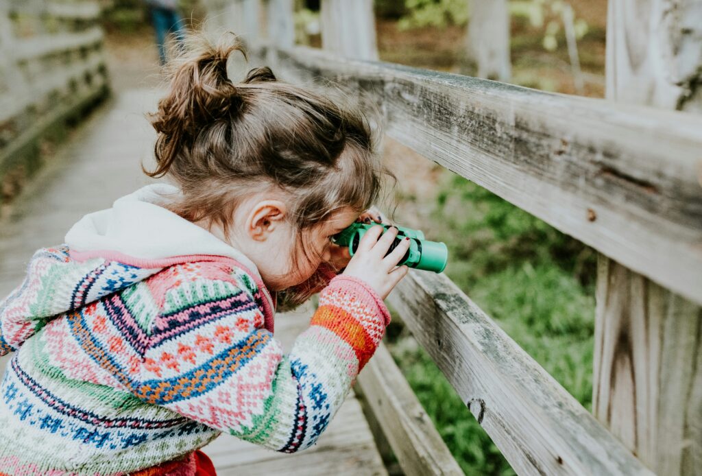 child searching for items
