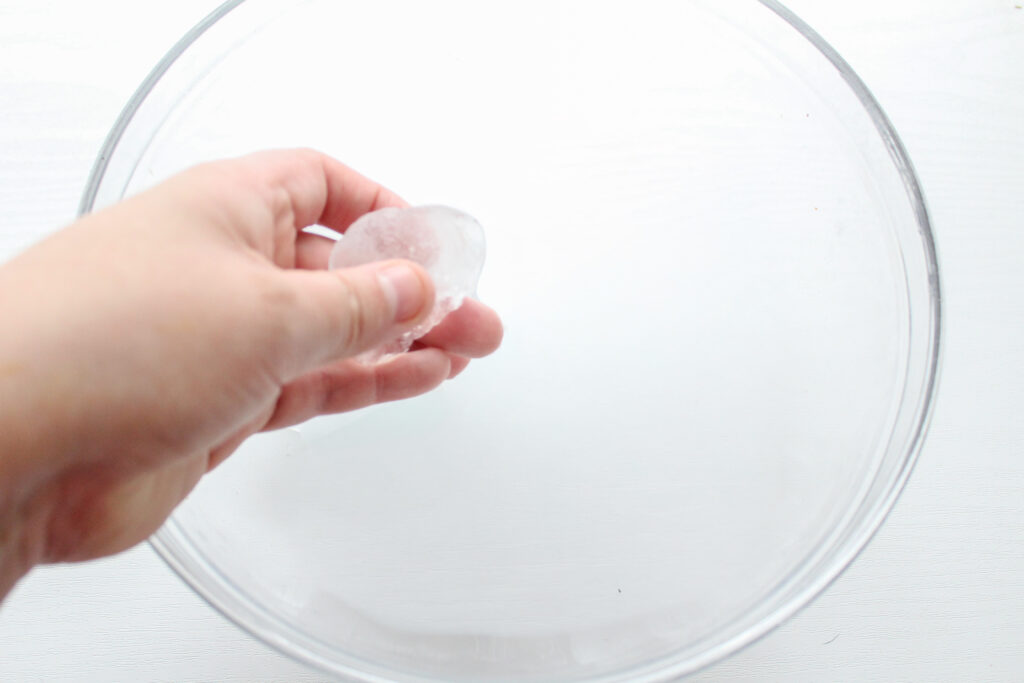 place an ice cube in a large bowl